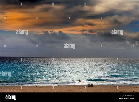 Red flag on the beach Stock Photo - Alamy