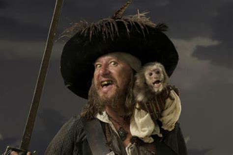 Geoffrey Rush as Captain Barbossa with his pet monkey - ABC News ...