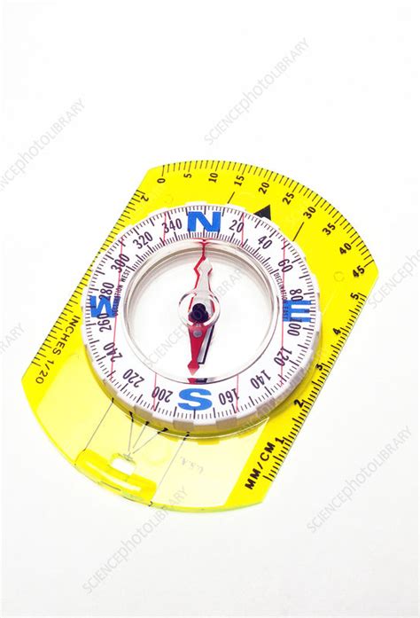 Compass pointing towards magnetic north - Stock Image - C004/6892 - Science Photo Library