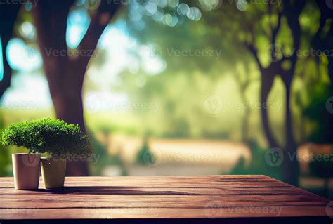 Empty table with blurry green natural park garden or backyard ...