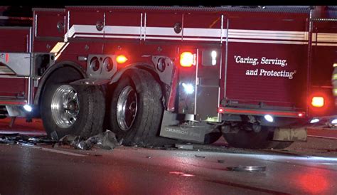 Woman in critical condition after SUV crashes into fire truck in Old ...