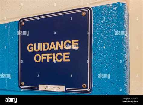 Guidance Office, counselor office, sign with braille, on blue wall at ...