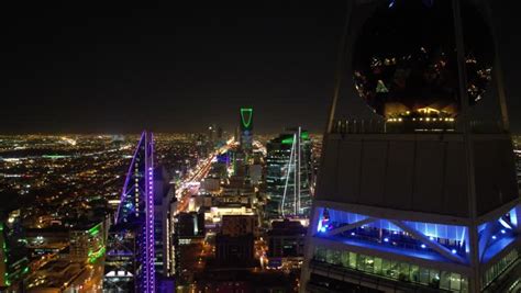 Night aerial photography of the Kingdom Tower in Riyadh, Saudi Arabia ...