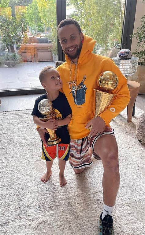 Stephen Curry's Son Cuddles Up to Dad as They Celebrate His NBA Finals Win