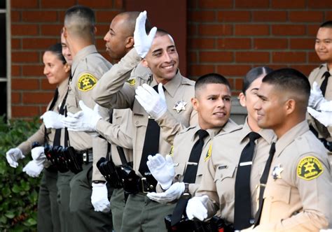 Photos: LA County sheriff congratulates diverse class of academy graduates – Daily News