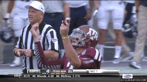 Johnny Manziel trash talks with autograph symbol, makes money gesture ...