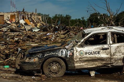 Destroyed police car and neighborhood after a EF-5 tornado touched down, Del City, Oklahoma ...