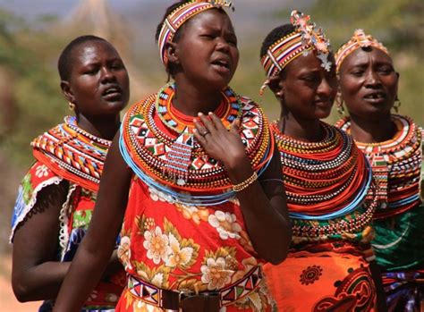 Samburu women in the community of Umoja in Kenya sell their beadwork at ...