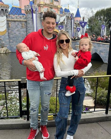 Patrick Mahomes Poses with Baby Son Bronze, Mickey and Minnie Mouse ...