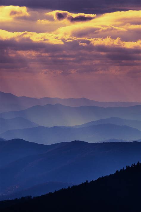 Sunset In A Cloudy Mountain Landscape by Moreiso