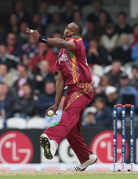 Dwayne Bravo runs in to bowl | ESPNcricinfo.com