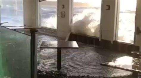 Watch: Storm surge floods waterfront restaurant in Birch Bay | KOMO