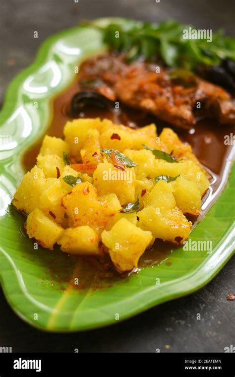 Top view tapioca with spicy hot Kerala fish curry Indian food. pearl ...