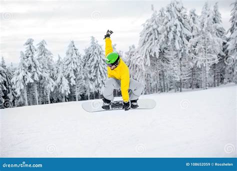 Man Snowboarding at the Mountains Stock Image - Image of adult, snowboarding: 108652059