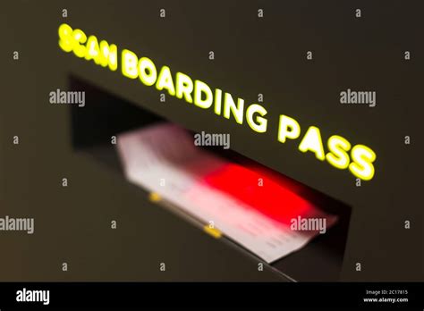 scan boarding pass in airport Stock Photo - Alamy