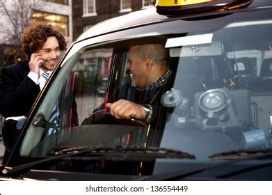 Taxi Cab Driver Communicating Male Passenger Stock Photo 136554449 ...