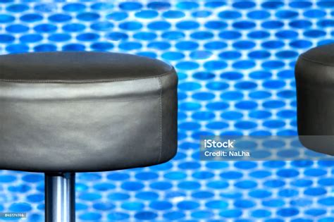 Modern Black Leather Barstool In Front Of Blurred Vigorous Blue Small ...