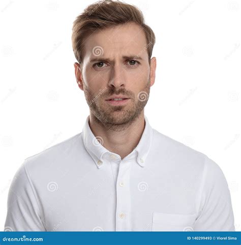 Young Casual Man with a Confused Face Stock Image - Image of perplexed, blank: 140299493