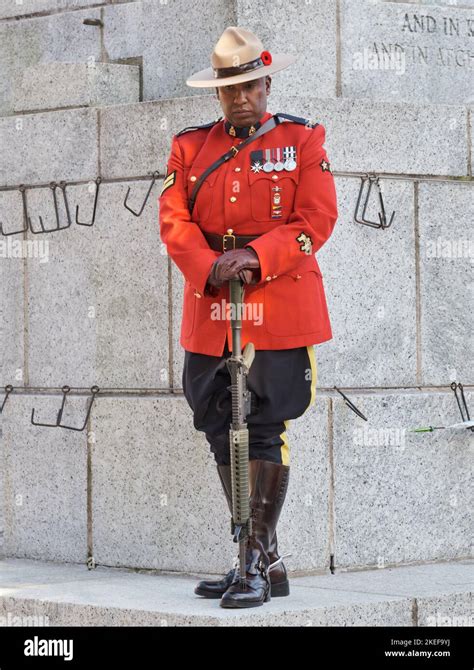 Halifax, Canada. November 11th, 2022. RCMP officer in traditional red uniform standing guard at ...