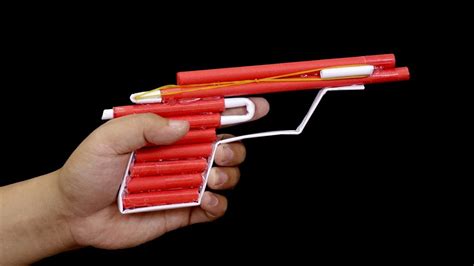 How to make a paper gun that shoots - YouTube