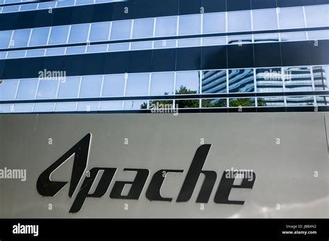 A logo sign outside of the headquarters of the Apache Corporation in Houston, Texas, on May 27 ...