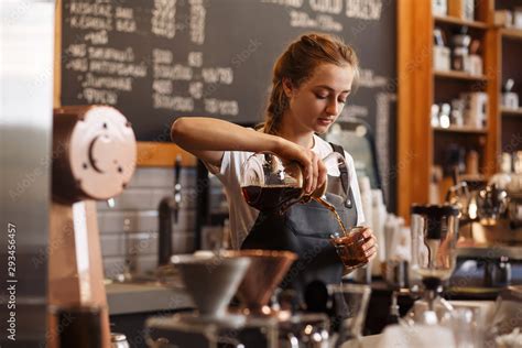 Professional barista preparing coffee using chemex pour over coffee ...