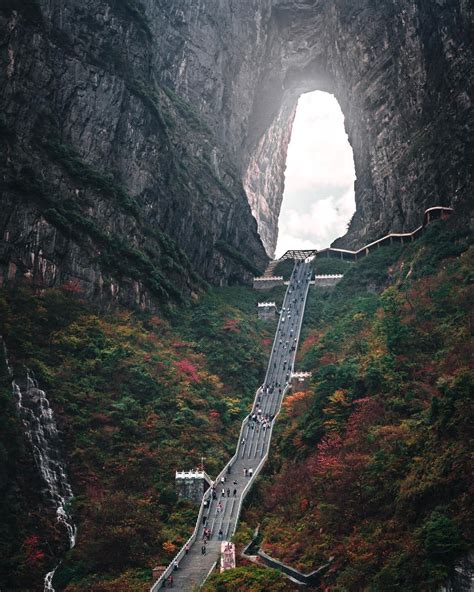 Tianmen natural arch at Tian Menshan Mountain, China (Photo by rkrkrkr) : r/megalophobia