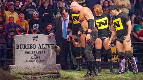 The grave history of Buried Alive Matches: photos | WWE