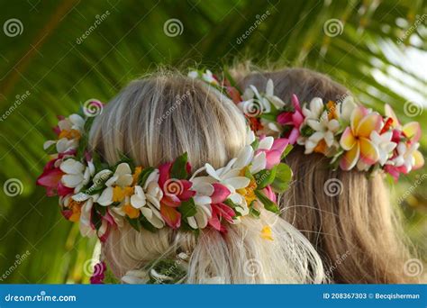 Traditional Tropical Frangipani Flower Lei Crowns on the Heads a Girl and Woman in the Cook ...