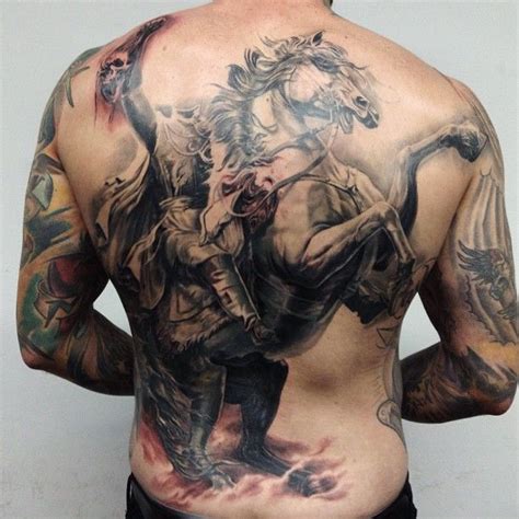 Tattoo by Carlos Torres | Horse tattoo design, Horse tattoo, Back tattoo