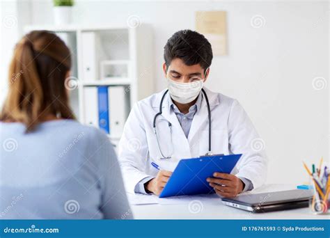 Doctor in Medical Mask and Patient at Hospital Stock Image - Image of ...