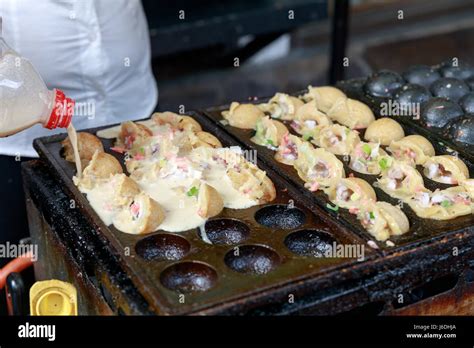 Making of Takoyaki - Japanese food style Stock Photo - Alamy