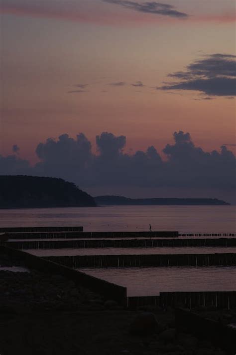 A Pier at Sunset · Free Stock Photo