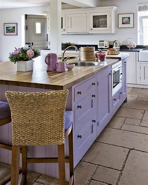 We are completely in love with this unique Lilac Kitchen 💜 The use of lilac paint on the island ...