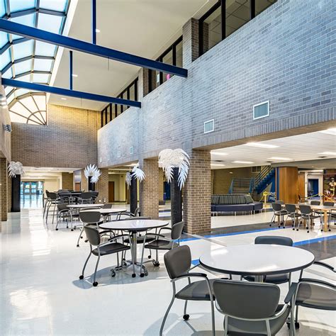 The commons area at Grand Prairie High School, TX is a sleek and modern gathering place where # ...