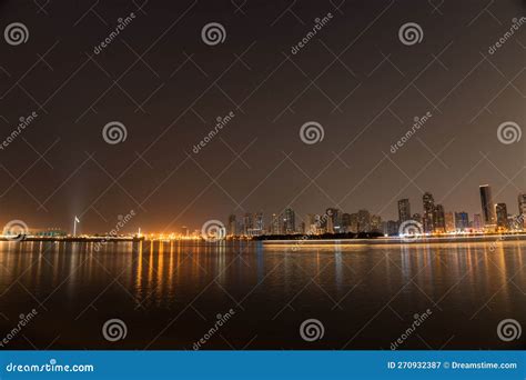 Sharjah Night Skyline by the Waterfront Showcasing the Vibrant Lights of the Cityscape Stock ...