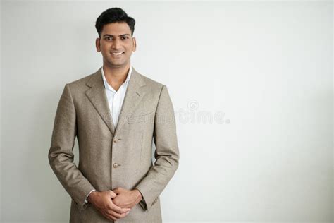 Smiling Indian Businessman stock image. Image of confidence - 261521411