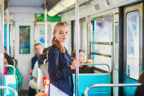 Beautiful Young Woman Travelling In A Train Of Parisian Subway Stock ...