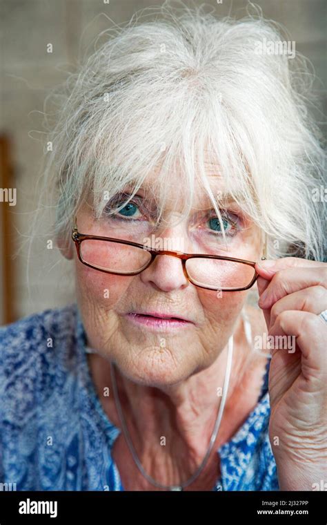 Netherlands, woman of 81 years old with reading glasses Stock Photo - Alamy