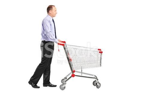 Man Pushing AN Empty Shopping Cart Stock Photos - FreeImages.com