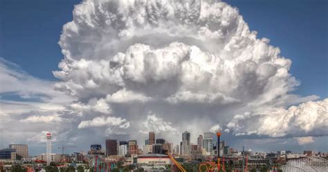 Dramatic Denver skyline sees cloud formation loom like nuclear blast in stunning photographs ...