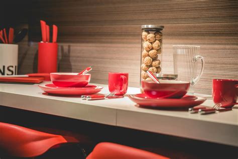 Red Dinnerware Set on Table · Free Stock Photo