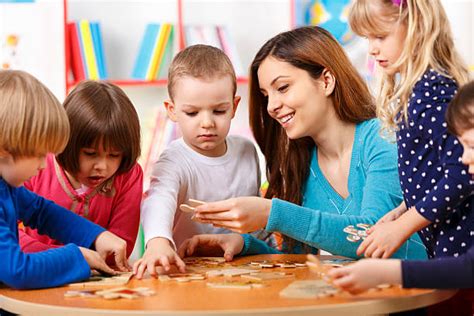 Best Kids Playing With Puzzles Stock Photos, Pictures & Royalty-Free ...