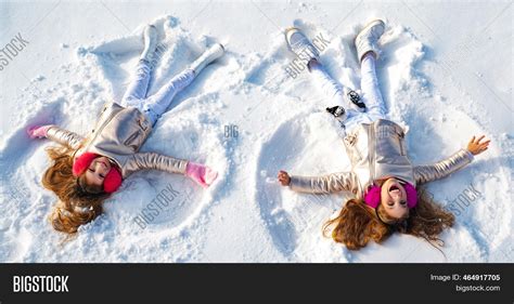 Winter Angels. Happy Image & Photo (Free Trial) | Bigstock