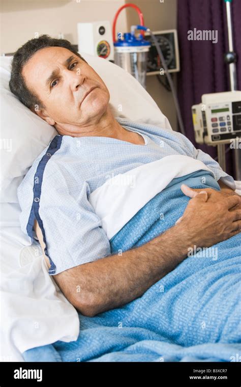 Man Lying In Hospital Bed Stock Photo - Alamy