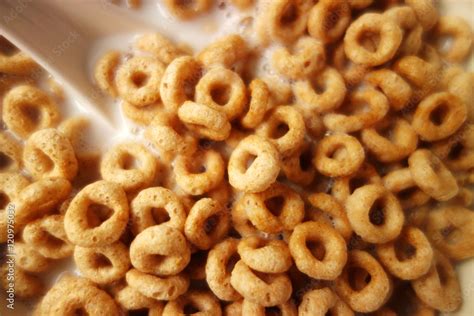 Cheerios - Bowl with cheerios whole grain cereals. Stock Photo | Adobe ...