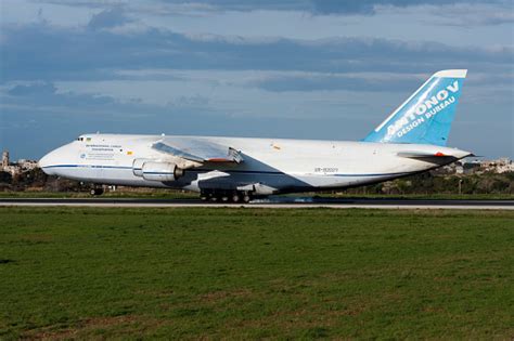 An Enormous Cargo Plane Landing Stock Photo - Download Image Now ...