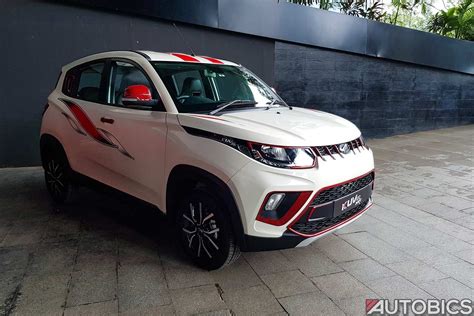 2017 mahindra kuv 100 nxt accessories white front right - AUTOBICS