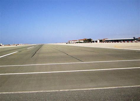 Gibraltar Airport Runway Crossing Uk Photograph by John Shiron