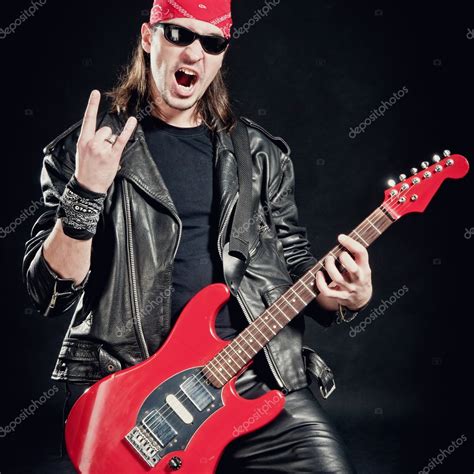 Rock-star playing a concert — Stock Photo © shivanetua #4381944